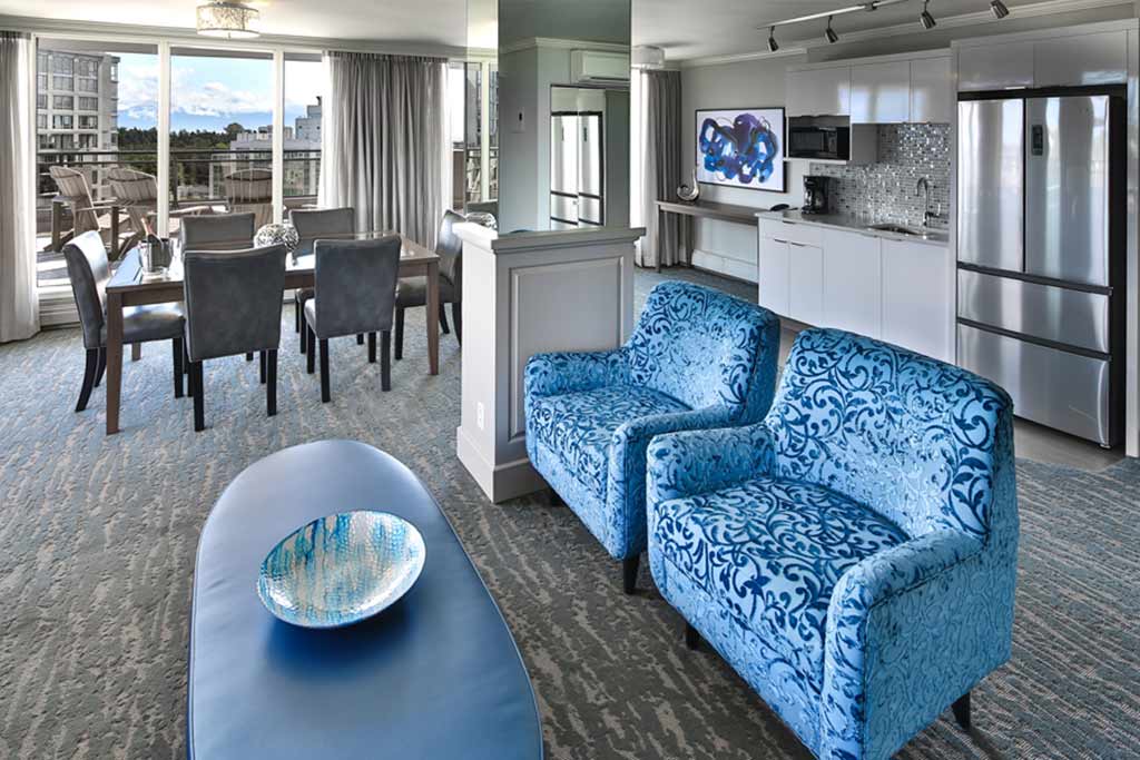 Stay in a spacious room with a stunning vista on your family vacation. Credit: Chateau Victoria Hotel & Suites