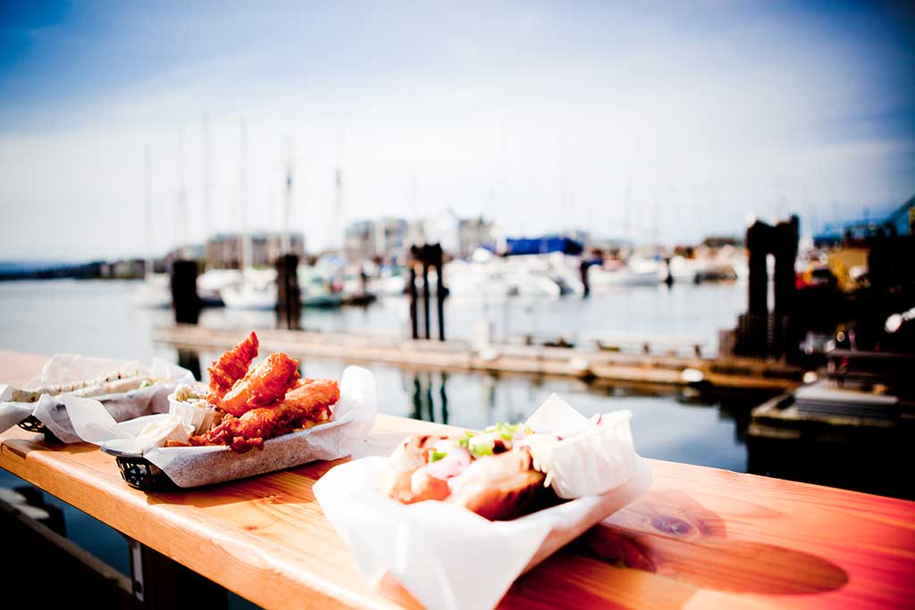 One of our favorite places for seafood with harbor views on a family vacation: Red Fish Blue Fish