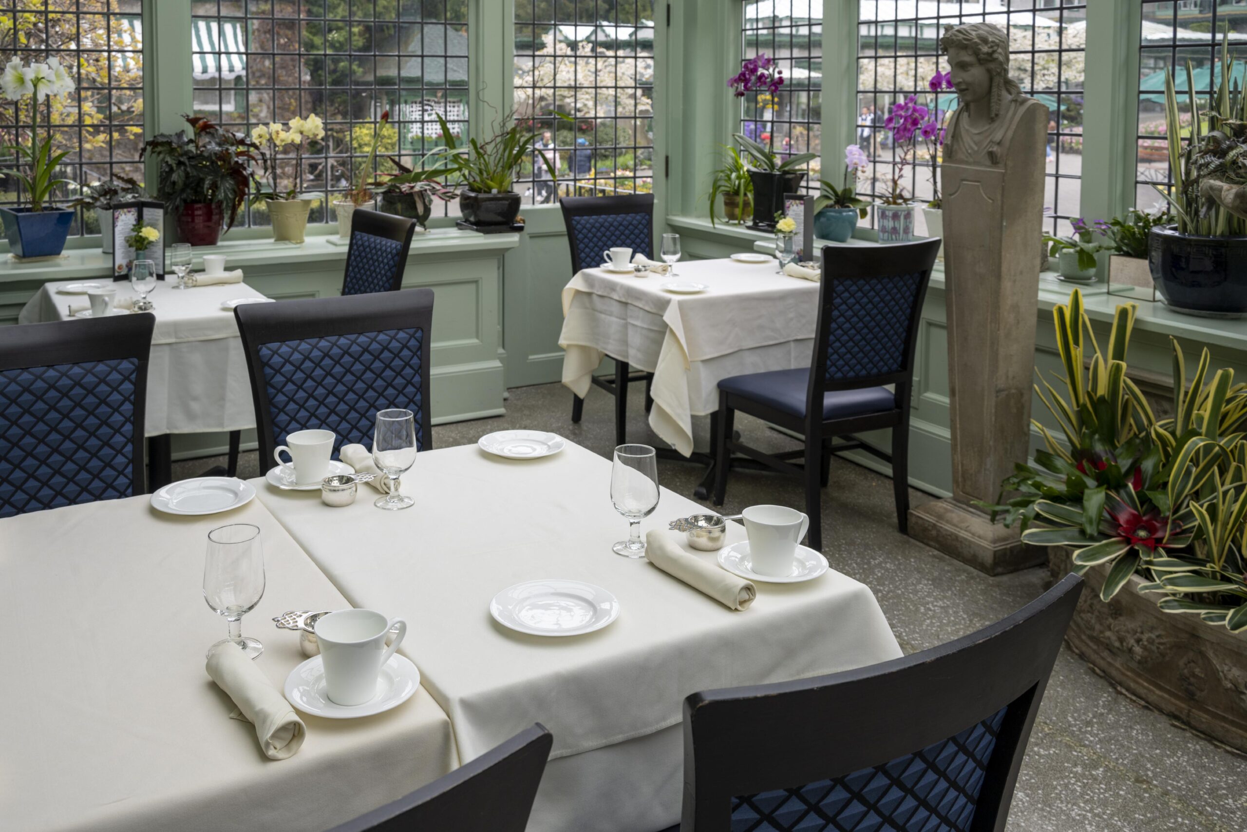 Feast on tasty eats while being surrounded by a variety of gorgeous blooms in the Dining Room Restuarant. Credit: The Butchart Gardens