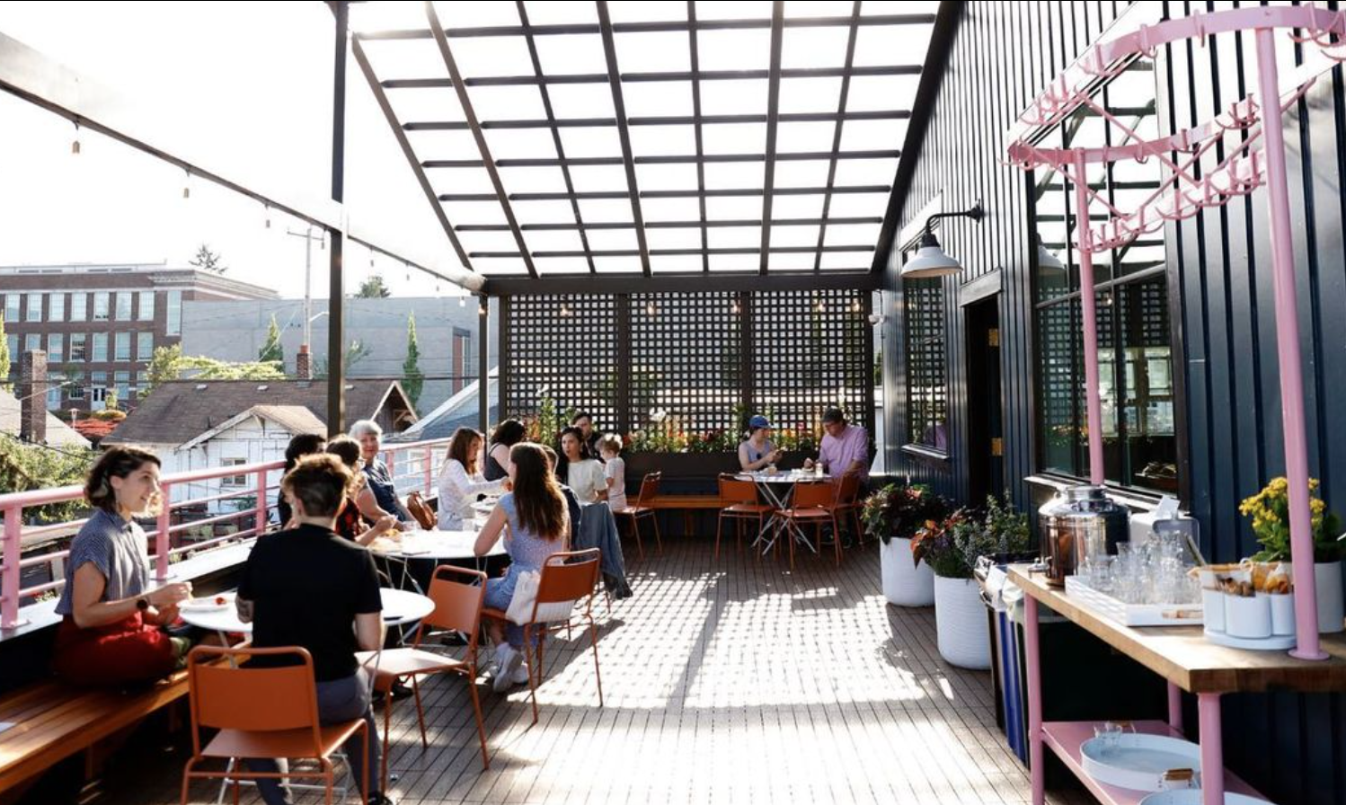 Some of the best outdoor dining in Seattle can be found at The Flora Bakehouse rooftop patio