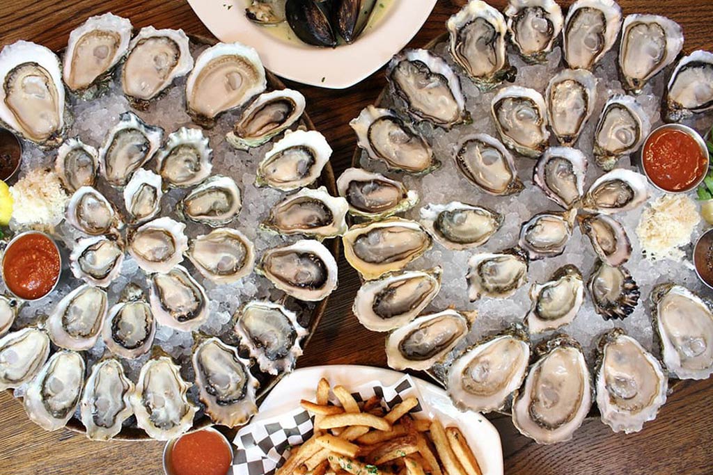 Fresh Northwest oysters as far as the eye can see at Taylor Shellfish. Credit: Hana B. via Yelp