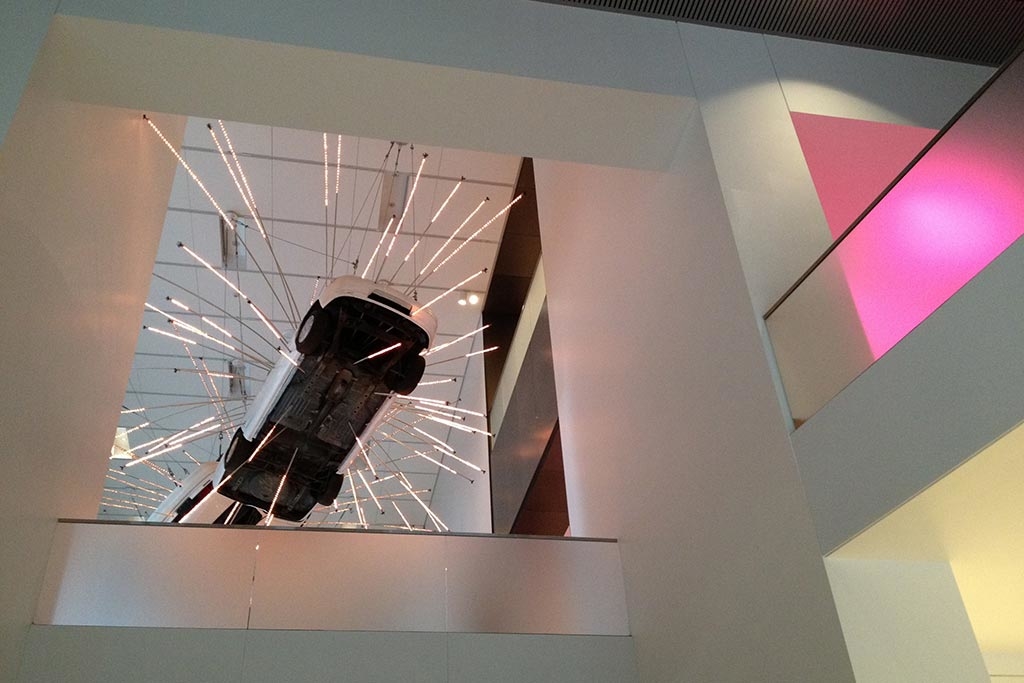 White Ford Tauruses in mid-free-fall welcome visitors to the Seattle Art Museum. Photo: Nam-ho Park